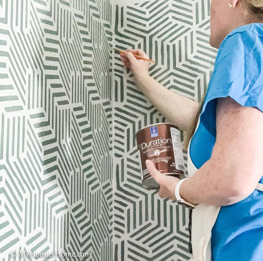 Bathroom Wall Stencil-3 Looking for a budget-friendly way to update your bathroom walls? Here are all my tips for creating a bathroom wall stencil that makes a huge statement.
