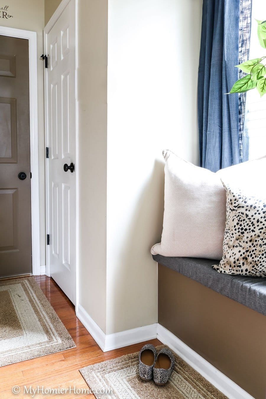 Garage Entryway-4 Learn how I transformed my tiny entryway window seat into a beautiful and functional space.