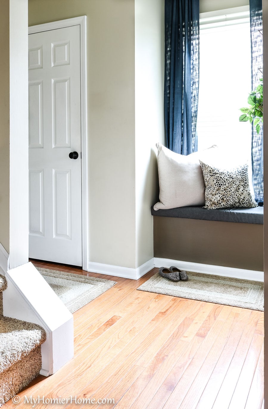 Garage Entryway-5 Learn how I transformed my tiny entryway window seat into a beautiful and functional space.