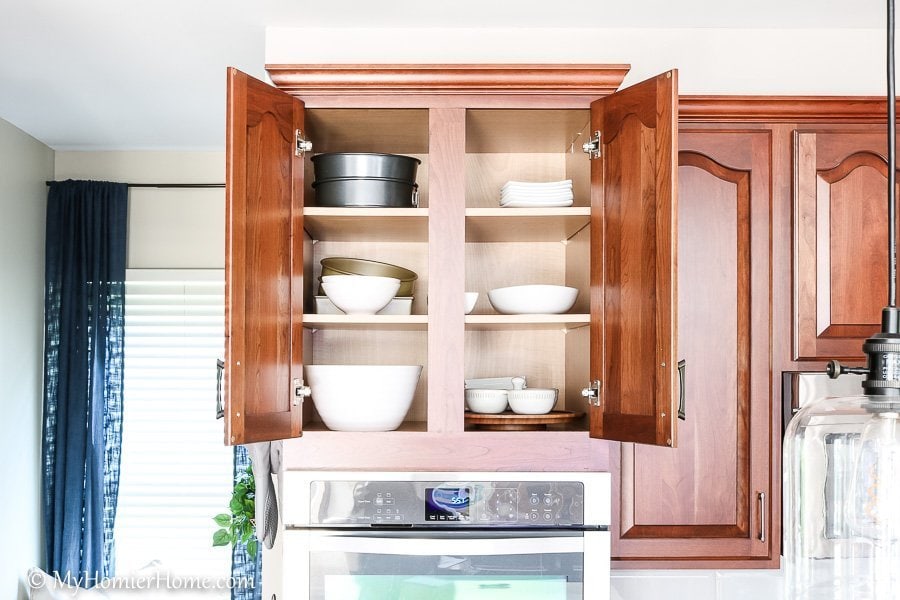 How to Organize Kitchen Cabinets-3 How to organize your kitchen cabinets using clear and simple strategies to tackle kitchen cabinet dysfunction without losing your mind - Above the stove (after)