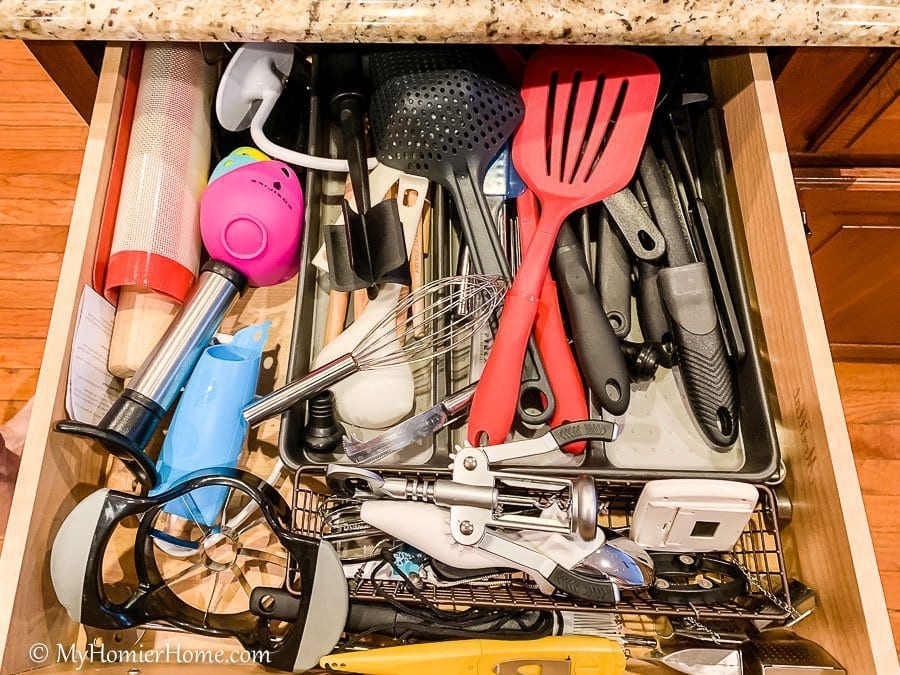 How to Organize Kitchen Cabinets-31 How to organize your kitchen cabinets using clear and simple strategies to tackle kitchen cabinet dysfunction without losing your mind. The extra utensil drawer before... yikes!