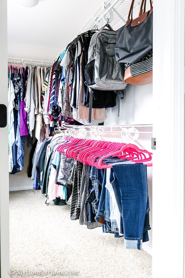Master Closet Declutter-18 When organizing your master closet, keep items sorted for easy access.