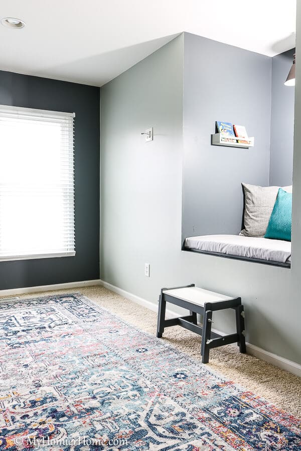 Reading Nook-2 Not sure what to do with that awkward old TV cutout in your wall? Repurpose it fora DIY reading nook! It'll make the cutest place to read for all!